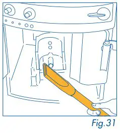 DeLonghi Magnifica - pick up all the residues using a vacuum cleaner