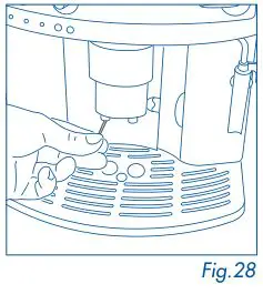 DeLonghi Magnifica - scrape the dry coffee residues with a needle