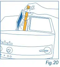 DeLonghi Magnifica - use a plastic knife to push the coffee down