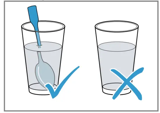 Place a spoon in the container